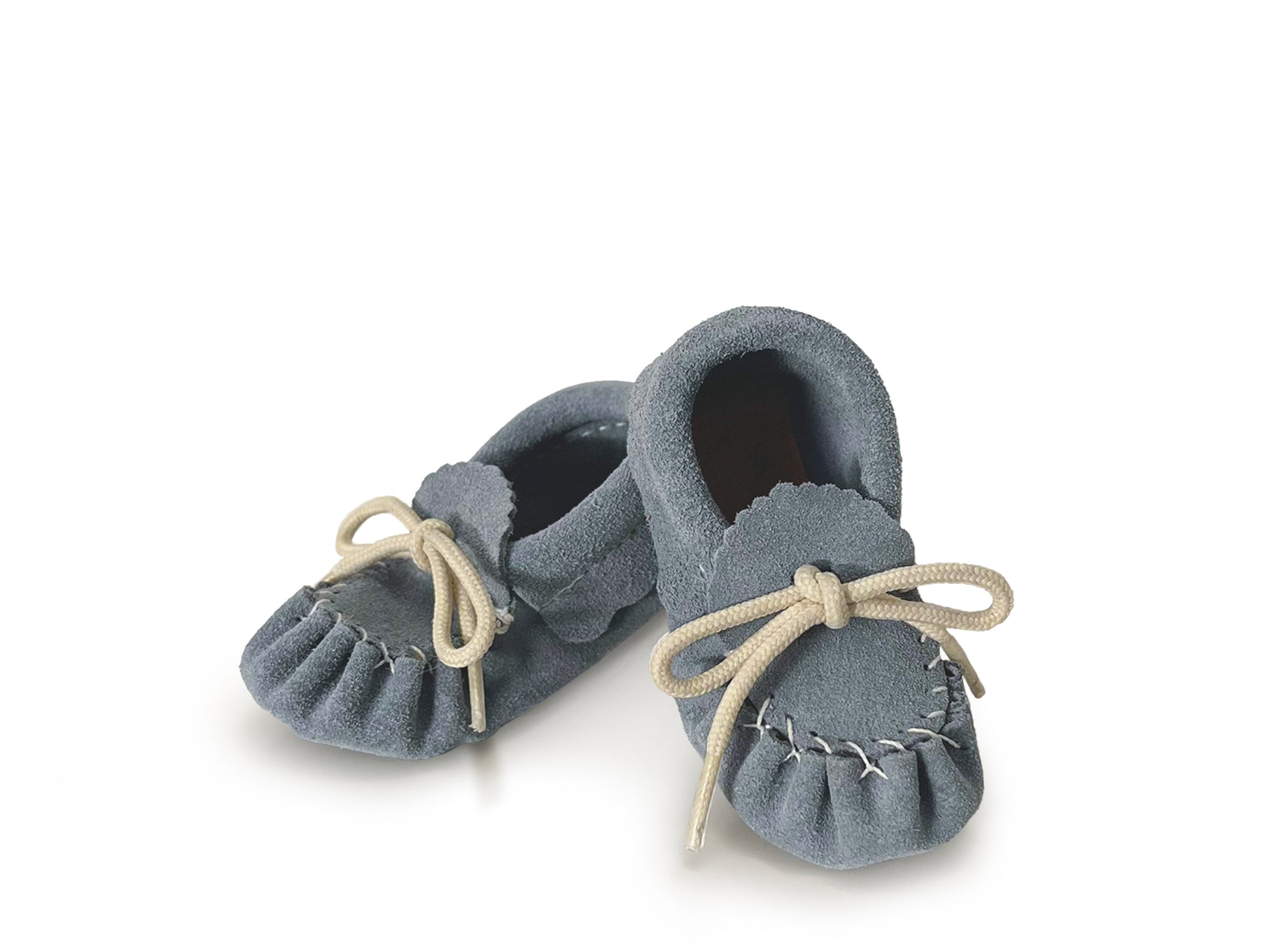 Baby suede moccasins with soft sole and lace up in color sky blue